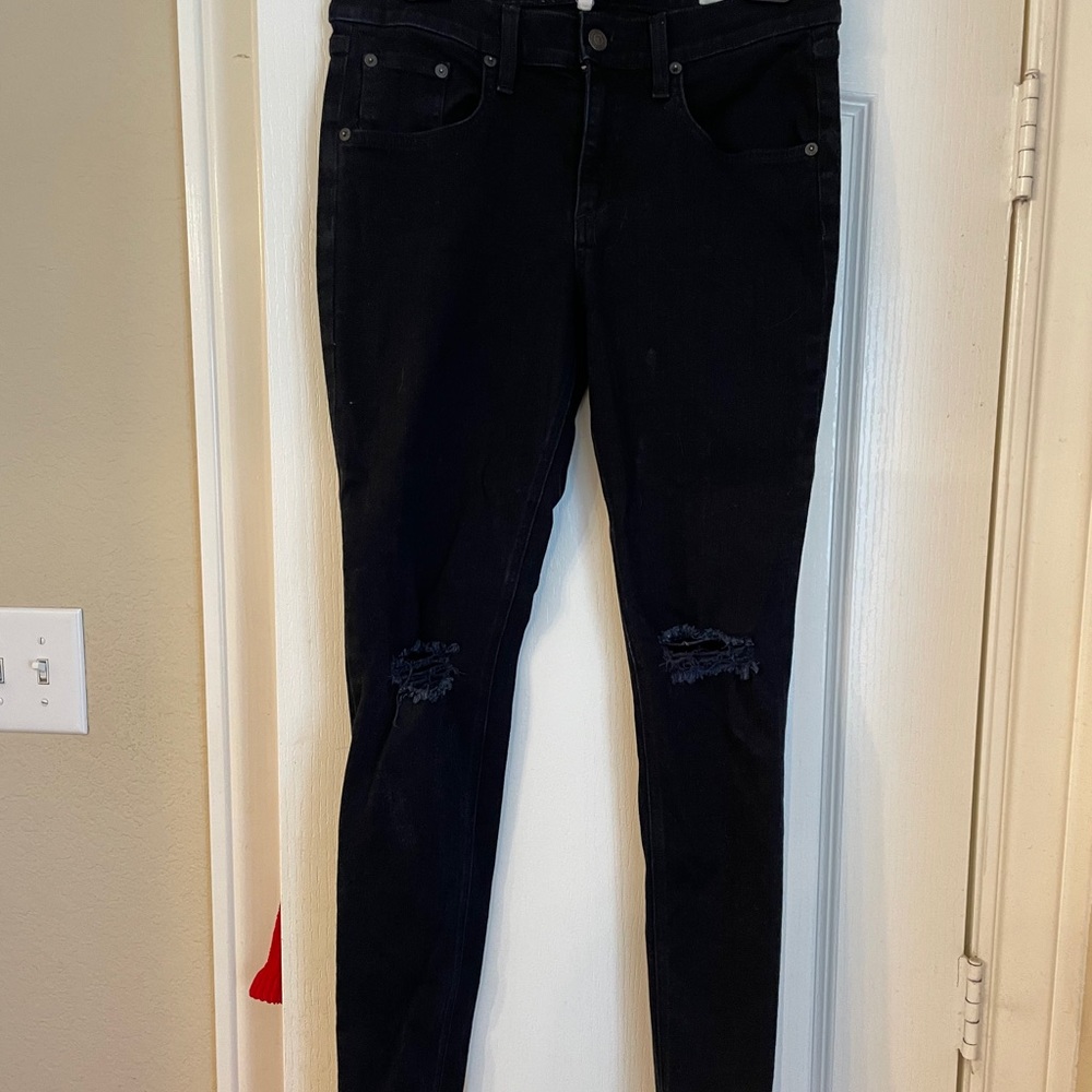 Rag & Bone skinny black jeans w/ rips at the knees